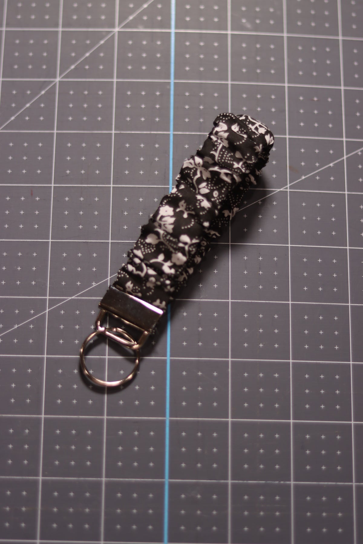White floral on Black Scrunchie Wristlet