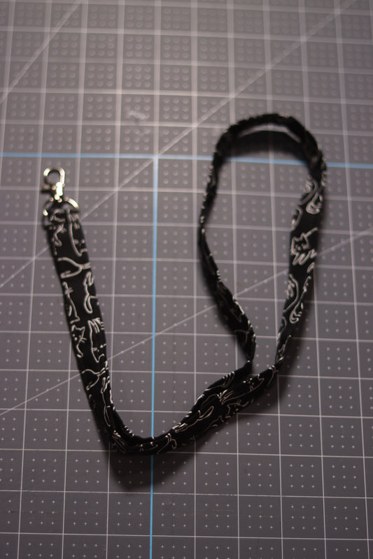 White Cats Outline on Black Lanyard