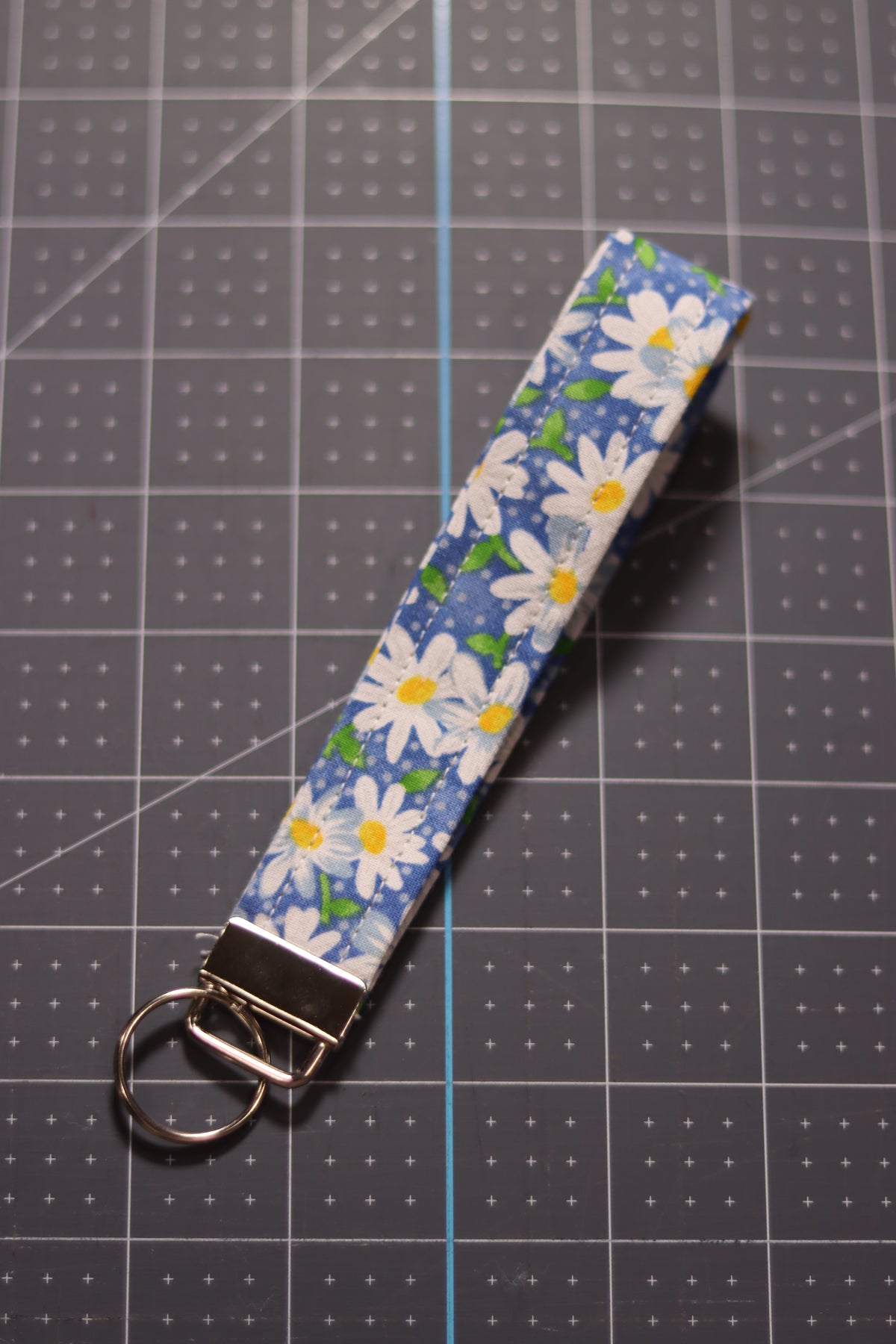 Daisies on Blue Wristlet